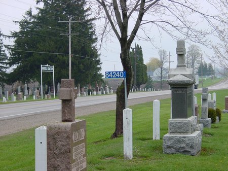 view of street number and road